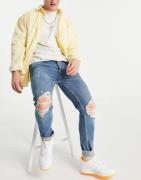 Topman - Blå skinny-jeans med stretch og flænger i økologisk bomuldsblanding