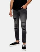 Topman - Vaskede sorte skinny-jeans med stretch og flænger i økologisk bomuldsblanding